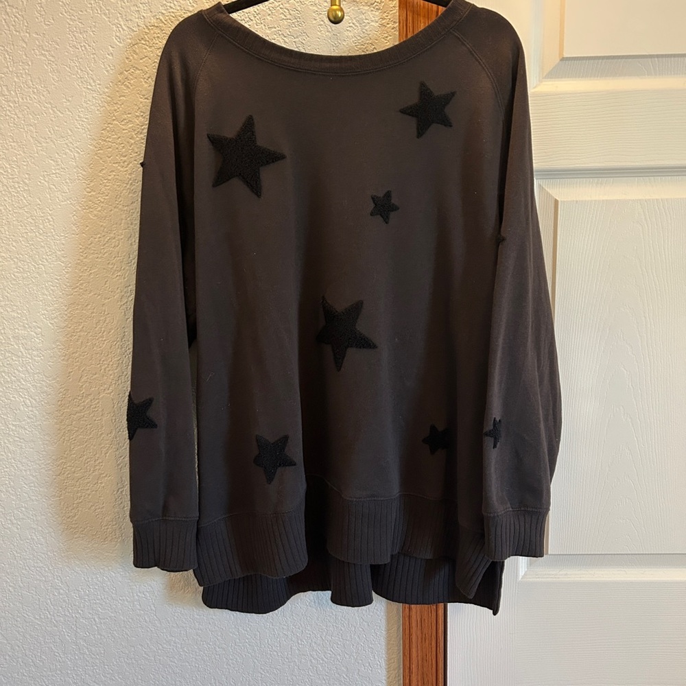 Maurice’s black star sweater!